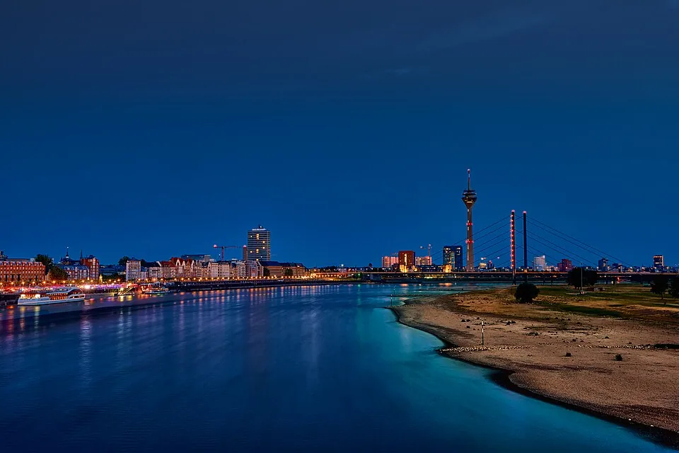 Düsseldorf skyline beside the Rhine at blue hour